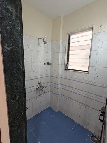 Bathroom in 1 BHK Apartment at Riddhi Gardens – for Sale