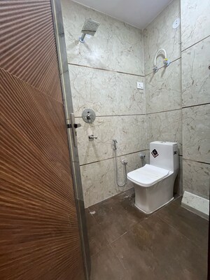 Bathroom in 3 BHK Builder Floor at Dwarka Mor – for Sale