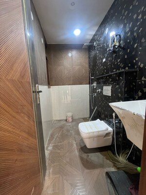 Bathroom in 3 BHK Builder Floor at Dwarka Mor – for Sale