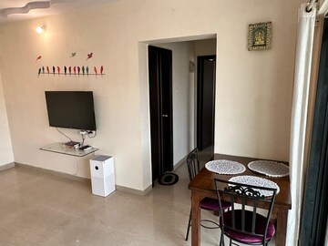 Living Room in 1 BHK Apartment at Blue Mountain Towers, Shashtri Nagar – for Rent