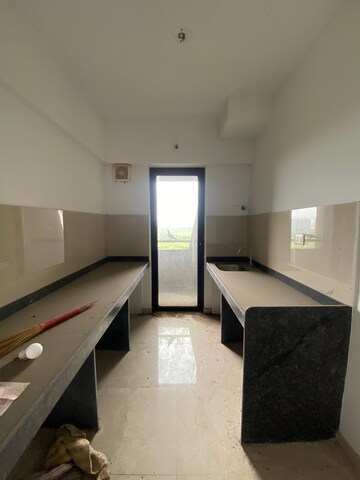 Kitchen in 1 BHK Apartment at Lodha Palava City Lakeshore Greens, Dombivli East – for Rent