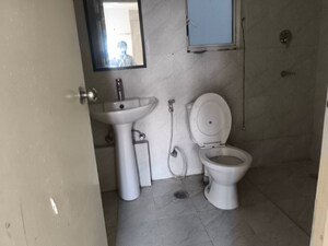 Bathroom in 3 BHK Apartment at Puri Aman Vilas, Sector 89 – for Sale