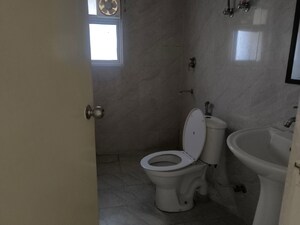 Bathroom in 3 BHK Apartment at Puri Aman Vilas, Sector 89 – for Sale