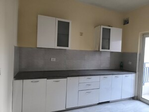 Kitchen in 3 BHK Apartment at Puri Aman Vilas, Sector 89 – for Sale
