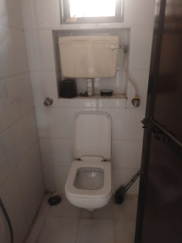 Bathroom in 1 RK Apartment at Hakimi CHS, Goregaon West – for Rent