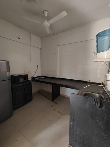 Kitchen in 2 BHK Apartment at Goel Ganga Estoria, Undri – for Rent