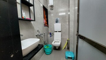 Bathroom in 3 BHK Apartment at Dheeraj Valley, Goregaon East – for Rent