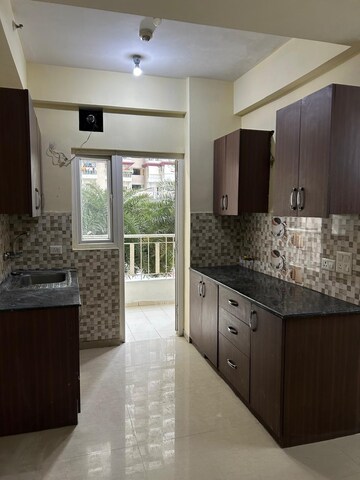 Kitchen in 2.5 BHK Apartment at Prateek Grand City, Siddharth Vihar – for Rent