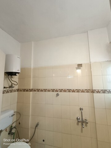 Bathroom in 1 RK Apartment at Maple Heights, Sector 43 – for Rent