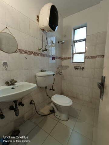 Bathroom in 1 RK Apartment at Maple Heights, Sector 43 – for Rent