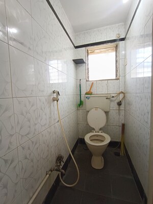 Bathroom in 1 BHK Apartment at Sortee Somnath Society, Dahisar West – for Sale