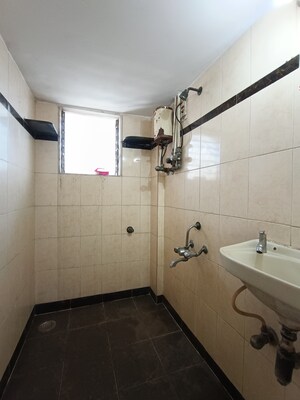 Bathroom in 1 BHK Apartment at Sortee Somnath Society, Dahisar West – for Sale