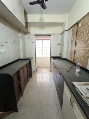 Kitchen in 1 BHK Apartment at Maheshwar CHS, Dahisar West – for Sale
