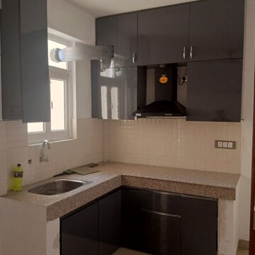Kitchen in 2 BHK Apartment at Signature Global Orchard Avenue, Sector 93 – for Rent