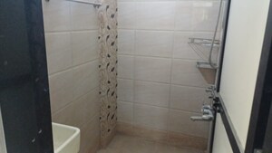 Bathroom in 1 BHK Apartment at Raunak Unnathi Greens, Kasarvadavali – for Sale