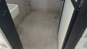 Bathroom in 1 BHK Apartment at Raunak Unnathi Greens, Kasarvadavali – for Sale