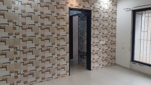 Living Room in 1 BHK Apartment at Raunak Unnathi Greens, Kasarvadavali – for Sale