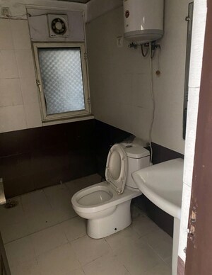 Bathroom in 3 BHK Apartment at Amrapali Zodiac, Sector 120 – for Sale