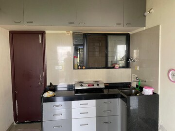 Kitchen in 2 BHK Apartment at Eisha Erica, Dhayari – for Sale