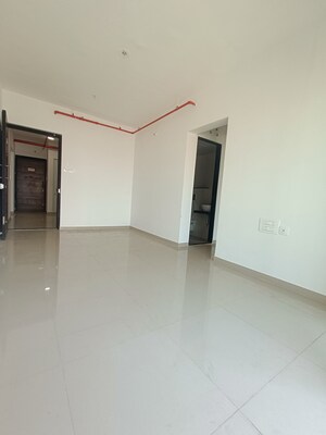 Living Room in 1 BHK Apartment at JP North Alexa, Mira Road – for Sale