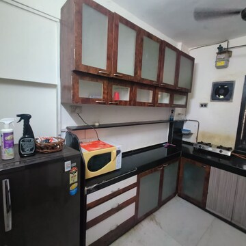 Kitchen in 2 BHK Apartment at Sarvodaya CHS Malad West, Gaikwad Nagar – for Rent