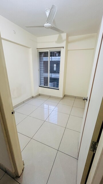 Room in 2 BHK Apartment at Prkriti Surbhi Mangalam, Dhanori – for Rent