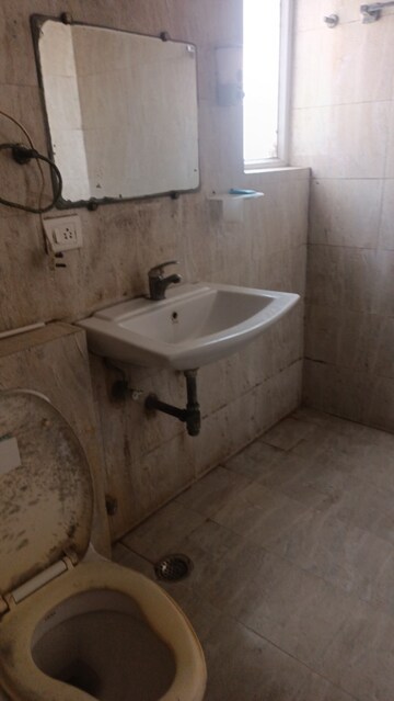 Bathroom in 3 BHK Apartment at Sunworld Vanalika, Sector 107 – for Rent