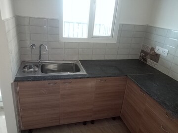 Kitchen in 3 BHK Apartment at Gaur Atulyam, Omicron I Greater Noida – for Rent
