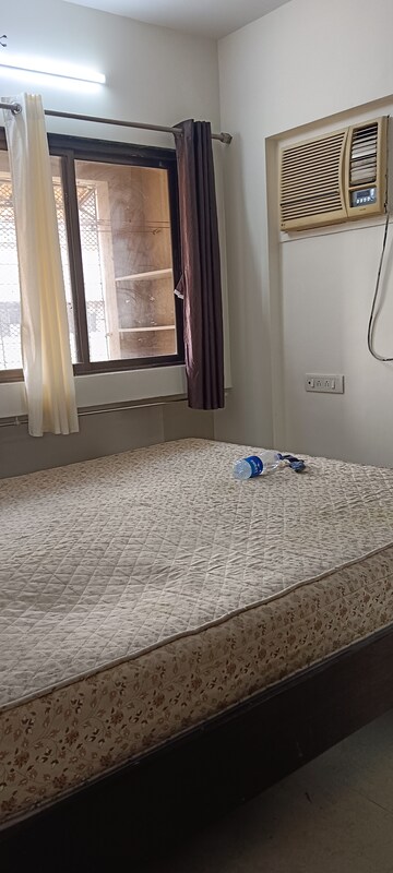 Bedroom in 2 BHK Apartment at Riddhi Garden, Malad East – for Rent
