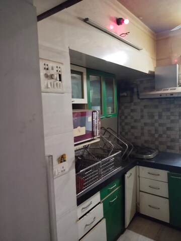 Kitchen in 3 BHK Apartment at Sundervan CHS Malad, Malad West – for Rent