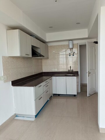 Kitchen in 2 BHK Apartment at Jaypee Greens Pavilion Heights 2, Sector 128 – for Rent