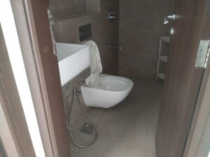 Bathroom in 3 BHK Apartment at Dhaval Sunrise Orlem, Malad West – for Sale