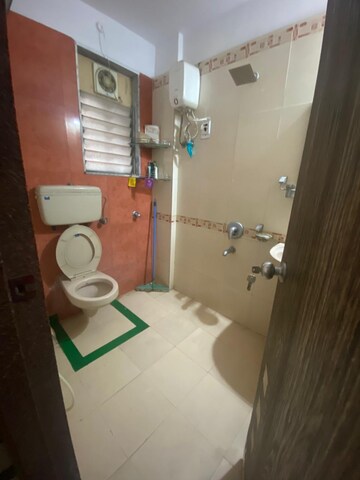 Bathroom in 2 BHK Apartment at Lodha Amara, Kolshet Road – for Rent