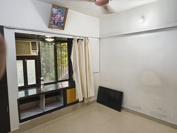 Living Room in 2 BHK Apartment at Gokul Garden CHS, Kandivali East – for Rent