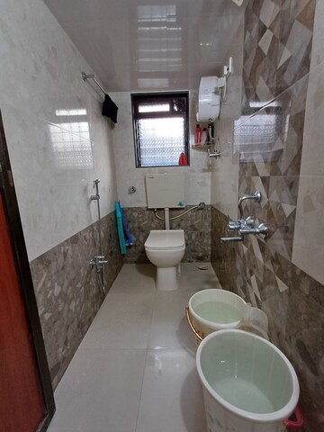 Bathroom in 2 BHK Apartment at Sahaj Mitra Chs, Kalwa – for Sale