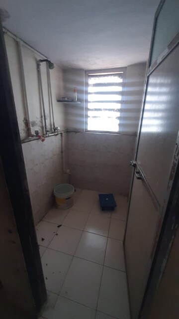 Bathroom in 1 BHK Apartment at New Rachana Park, Kalyan East – for Rent