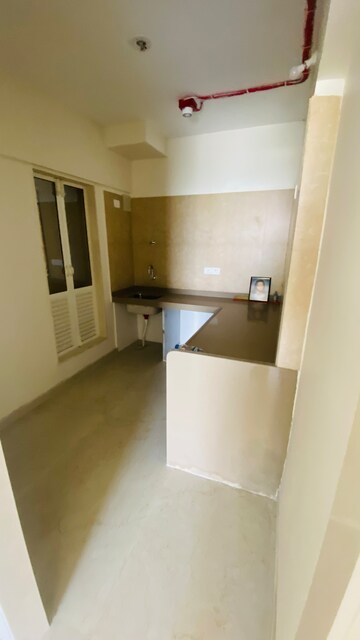 Kitchen in 2 BHK Apartment at Dosti West County Phase 4 Dosti Pine, Balkum Pada – for Rent