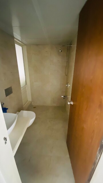 Bathroom in 2 BHK Apartment at Dosti West County Phase 4 Dosti Pine, Balkum Pada – for Rent