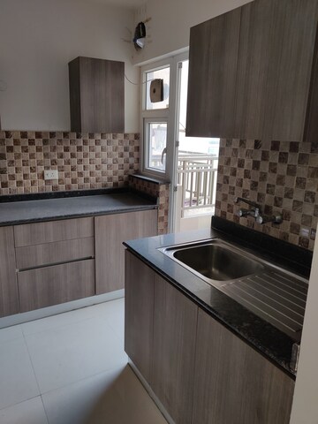 Kitchen in 3 BHK Apartment at Adani M2K Oyster Grande, Sector 102 – for Rent