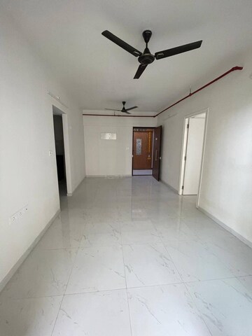 Living Room in 1 BHK Apartment at Runwal Gardens, Dombivli East – for Rent