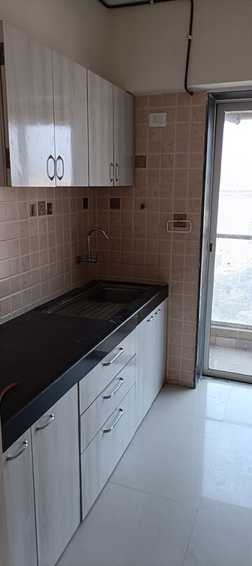Kitchen in 3 BHK Apartment at Amann Solitaire, Borivali West – for Rent