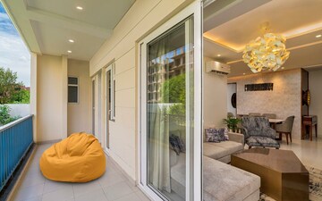 Living Room in 3 BHK Apartment at Motia Blue Ridge, Dhakoli Village – for Sale
