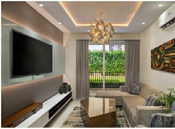 Living Room in 3 BHK Apartment at Motia Blue Ridge, Dhakoli Village – for Sale