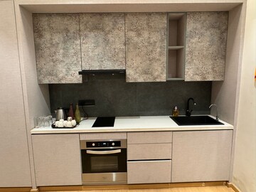 Kitchen in Studio Apartment at Galaxy Blue Sapphire Plaza, Sector 4, Greater Noida – for Rent