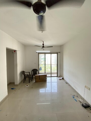 Living Room in 1 BHK Apartment at Casa Rio Columbia CHS, Dombivli East – for Rent