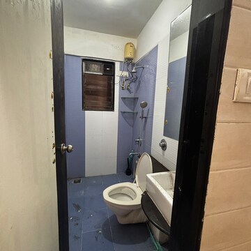 Bathroom in 3 BHK Apartment at Prarthna Heights, Parel – for Rent