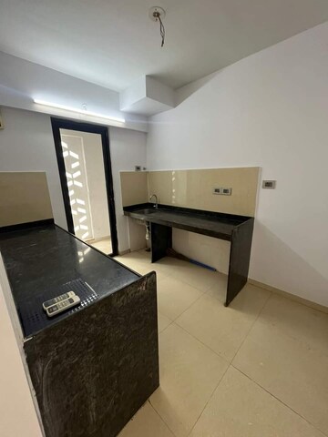 Kitchen in 2.5 BHK Apartment at Lodha Palava Downtown, Dombivli East – for Rent