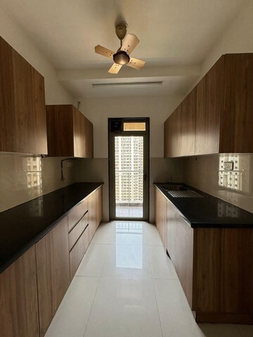 Kitchen in 2 BHK Apartment at Lodha Splendora Platino, Ghodbunder Road – for Rent