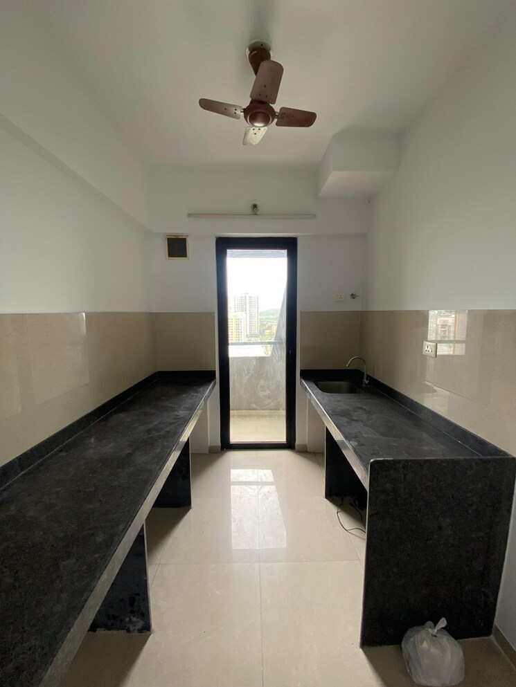 Kitchen, lodha-palava-city-lakeshore-greens 1 Bedroom 676 Sq.Ft. Apartment In Dombivli East Thane 8447481