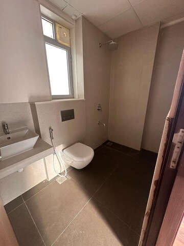 Bathroom in 2 BHK Apartment at Piramal Vaikunth, Balkum Pada – for Rent